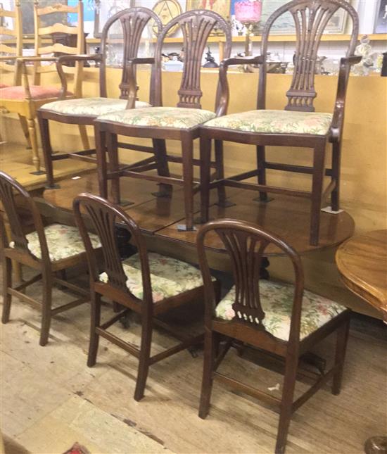 Mahogany dining table and 6 Hepplewhite style dining chairs